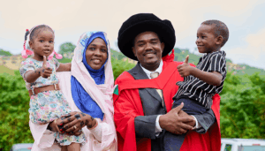 PhD in Computer Engineering graduate Dr Mortda Adam with his daughter Ms Aseel Adam, wife Ms Zobiada Adam, and son, Mr Ahmed Adam.