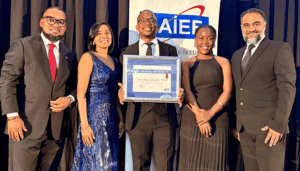 Receiving the award are (from left) national and provincial SAIEE Council Member Mr Nkosinathi Ndlela, outgoing SAIEE KZN Centre Chairperson Ms Krystle Nageshar, UKZN Student Chapter Chairperson Mr Ntuthuko Zulu, Deputy Chairperson Ms Nombulelo Ngidi, and Dr Mohamed Fayaz Khan.